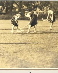 Girls playing field hockey, 1938
