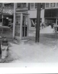Fire hydrant water release with Olympic theater