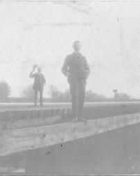 Two men standing on Werner’s Bridge