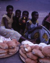 Children at bread stand in Accra street market