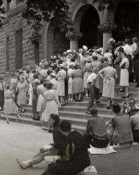 Crowd waiting at Washington school to register for sugar