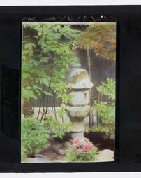 Japan. [Stone lantern in garden]