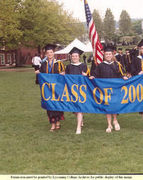 Graduates Carry 'Class of 2003' Banner to Graduation Ceremony