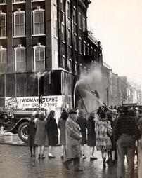 Fire at Widmann and Teah drug store, Third and Pine Streets, February, 1945