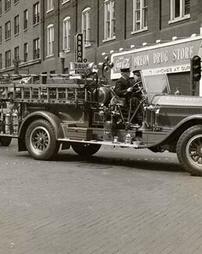 Fire trucks in parade, 1941
