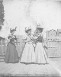 Women standing in front of H. Staub's residence