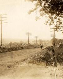 Workmen laying drainage pipes along "Missing Link", West Fourth Street fronting W. P. Felix Vineyard September 9, 1926