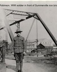 Wilbur Robinson, WWI soldier in front of old Summerville iron bridge