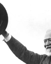 (Andrew Carnegie raises his hat)