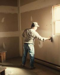 Man Patching Drywall