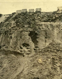 View showing face of quarry and splitting houses