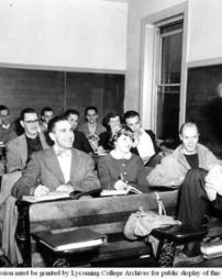 Dr J. Milton Skeath and Students in a Classroom