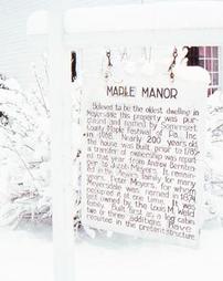 Maple Manor Sign in Snow