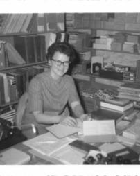 A librarian at a work desk