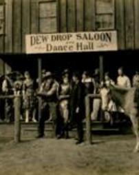 Film still from "High Pockets" showing the exterior of the Dew Drop Saloon and Dance Hall