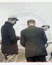 Christy Mathewson with field umpire and player