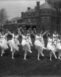 615, Play Cast Outside, Girls with Flowers Around Head and Neck Doing Fairy Dance, Stockings on Legs, 1918 Report, 8x10